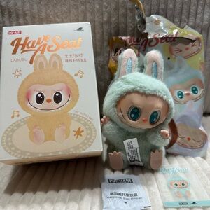 QUQU - Labubu Have A Seat Figure. New.Verified.  Such a cute green!